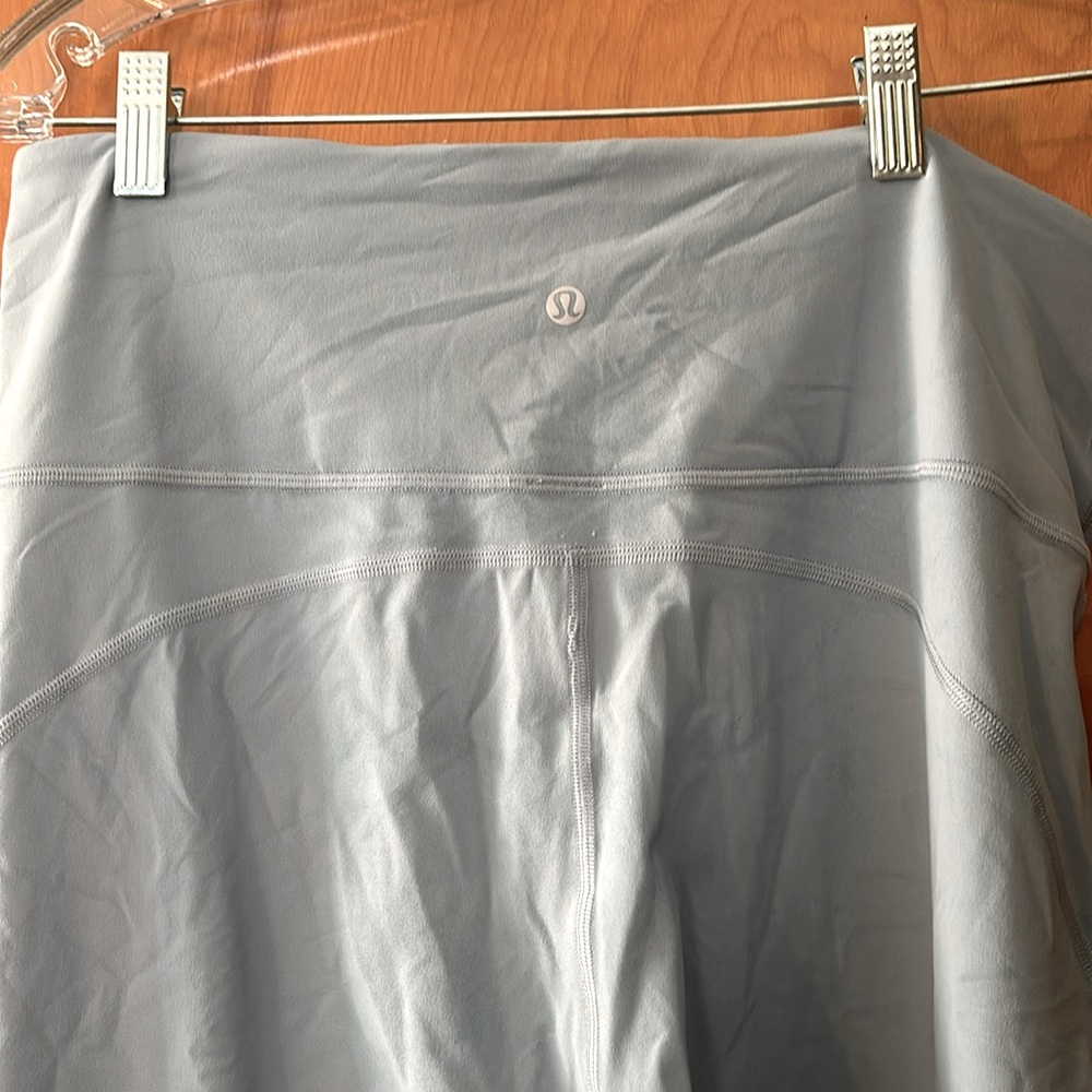 Never worn Lululemon flare leggings, size 14